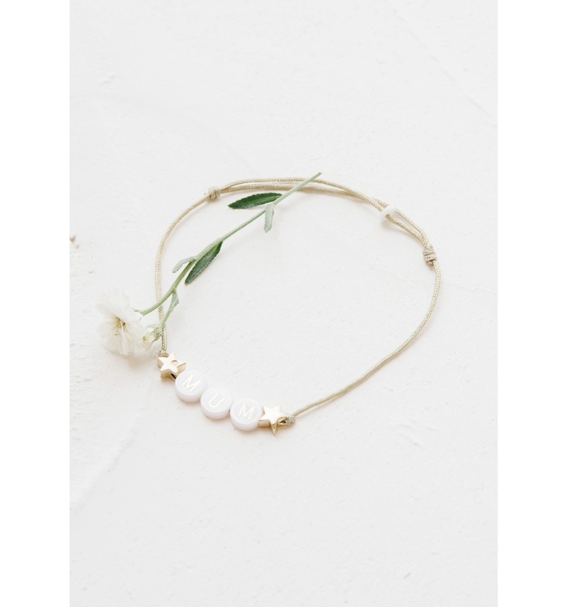 bracelet perle(s) céramique + 2 étoiles plaquées or
