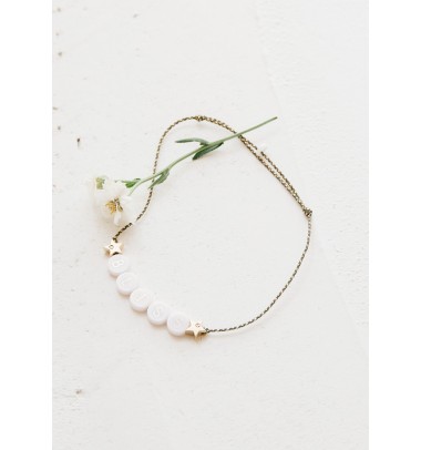 bracelet perle(s) céramique + 2 étoiles en or