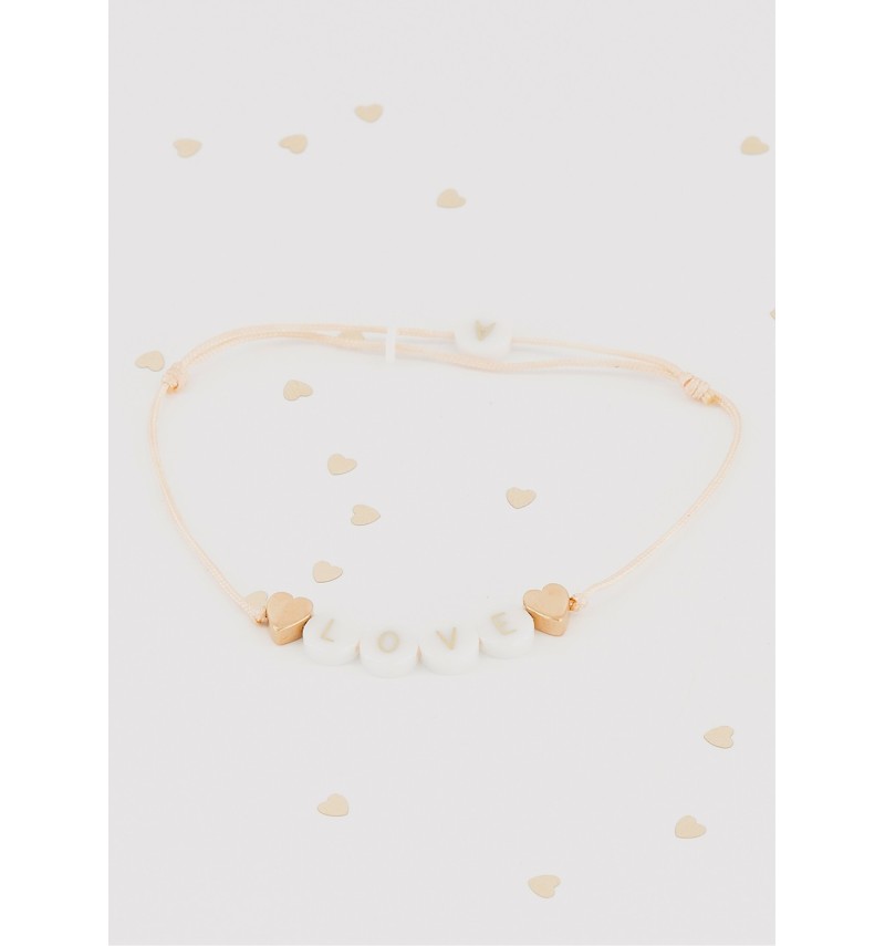 bracelet perle(s) céramique + 2 coeurs en or
