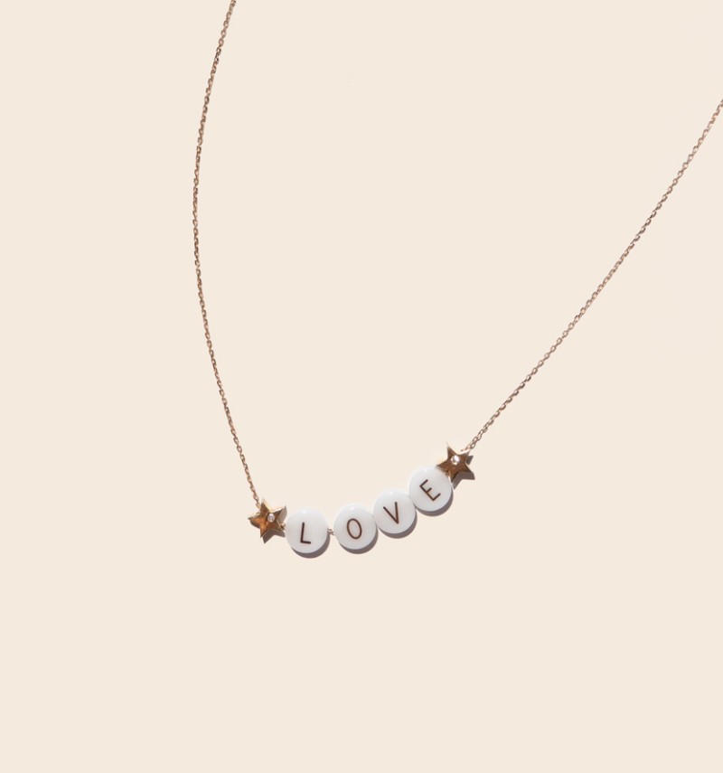 very very precious "love" necklace