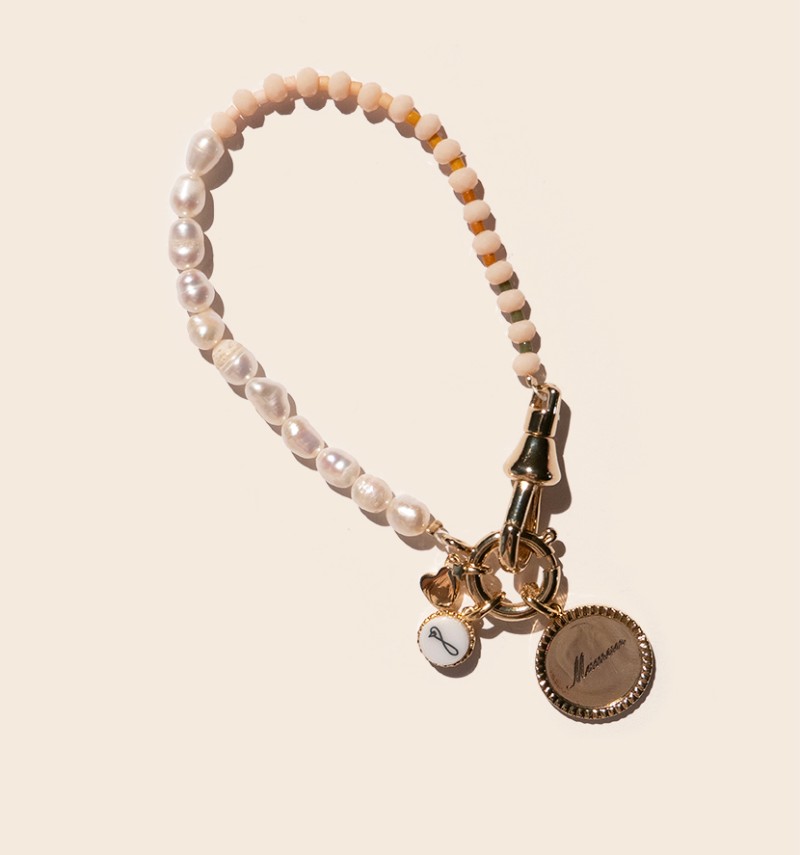 Olivia bracelet with its charms astrological sign