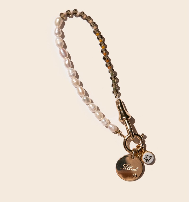 Olivia bracelet with its charms astrological sign