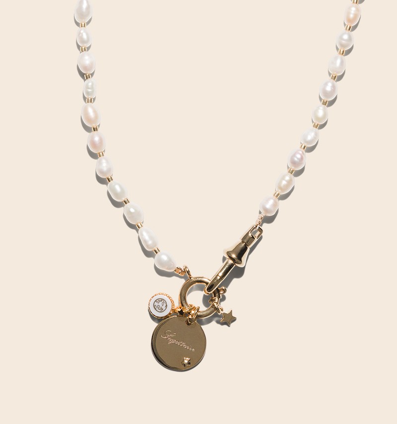 Ysée necklace with its astrological sign charms