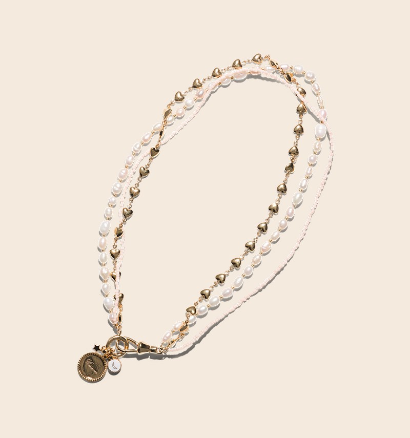 collier Nine avec ses...