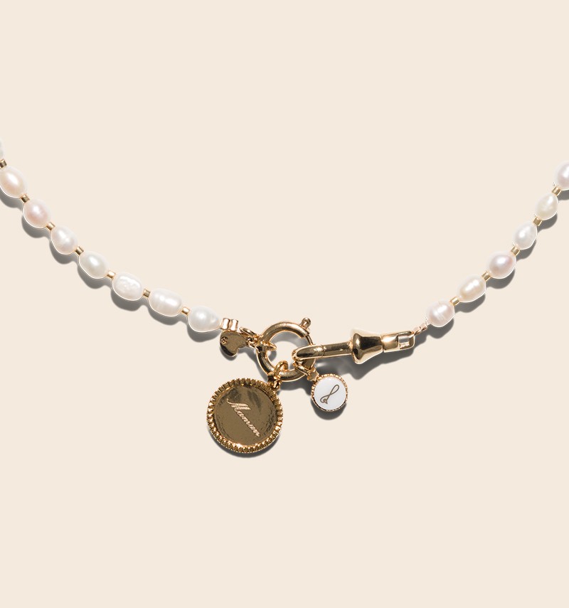 Ysée necklace with its charms