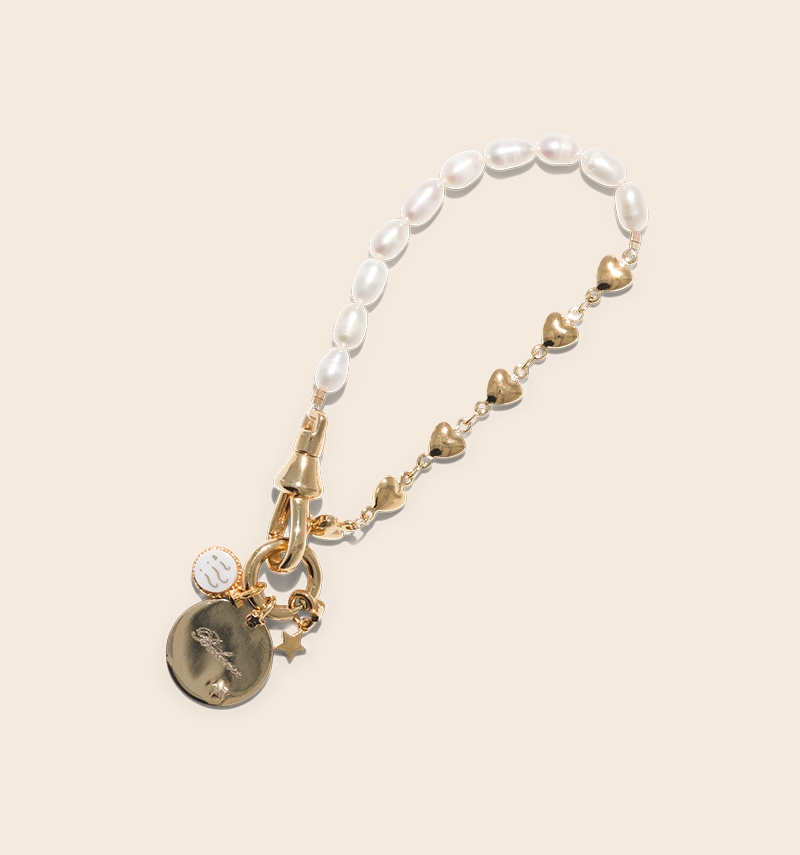 Alma bracelet with its astrological sign charms